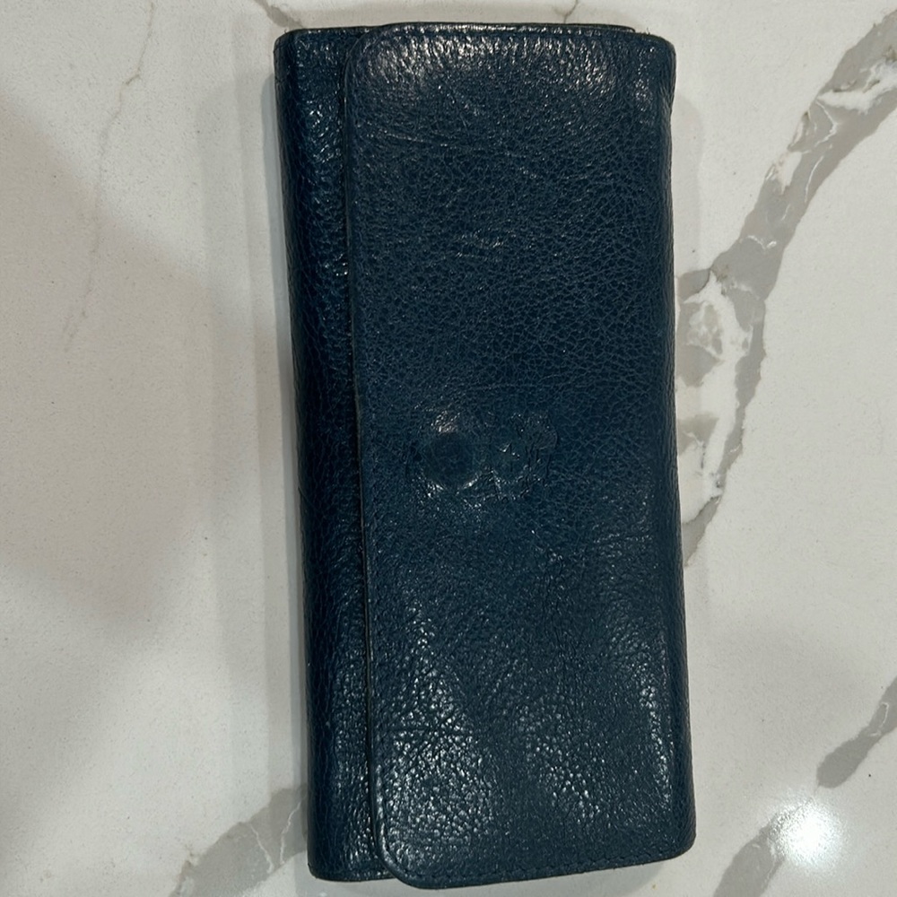 IL Bisonte gently used Women’s continental wallet in blue soft calf leather